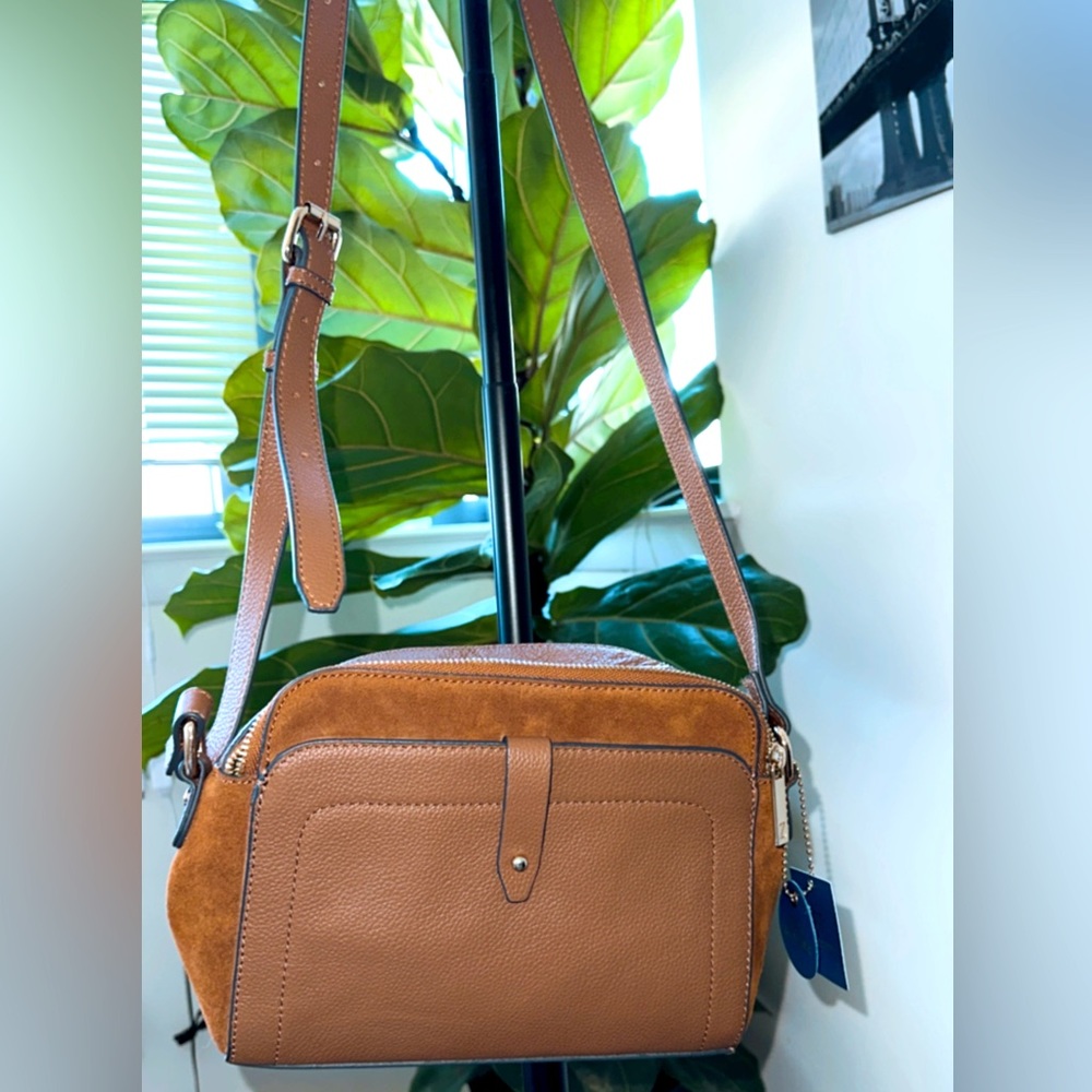 Brown leather crossbody from Italy. Never before used and real leather.